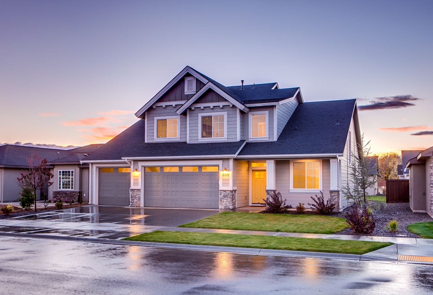 Beautiful modern home exterior at sunset
